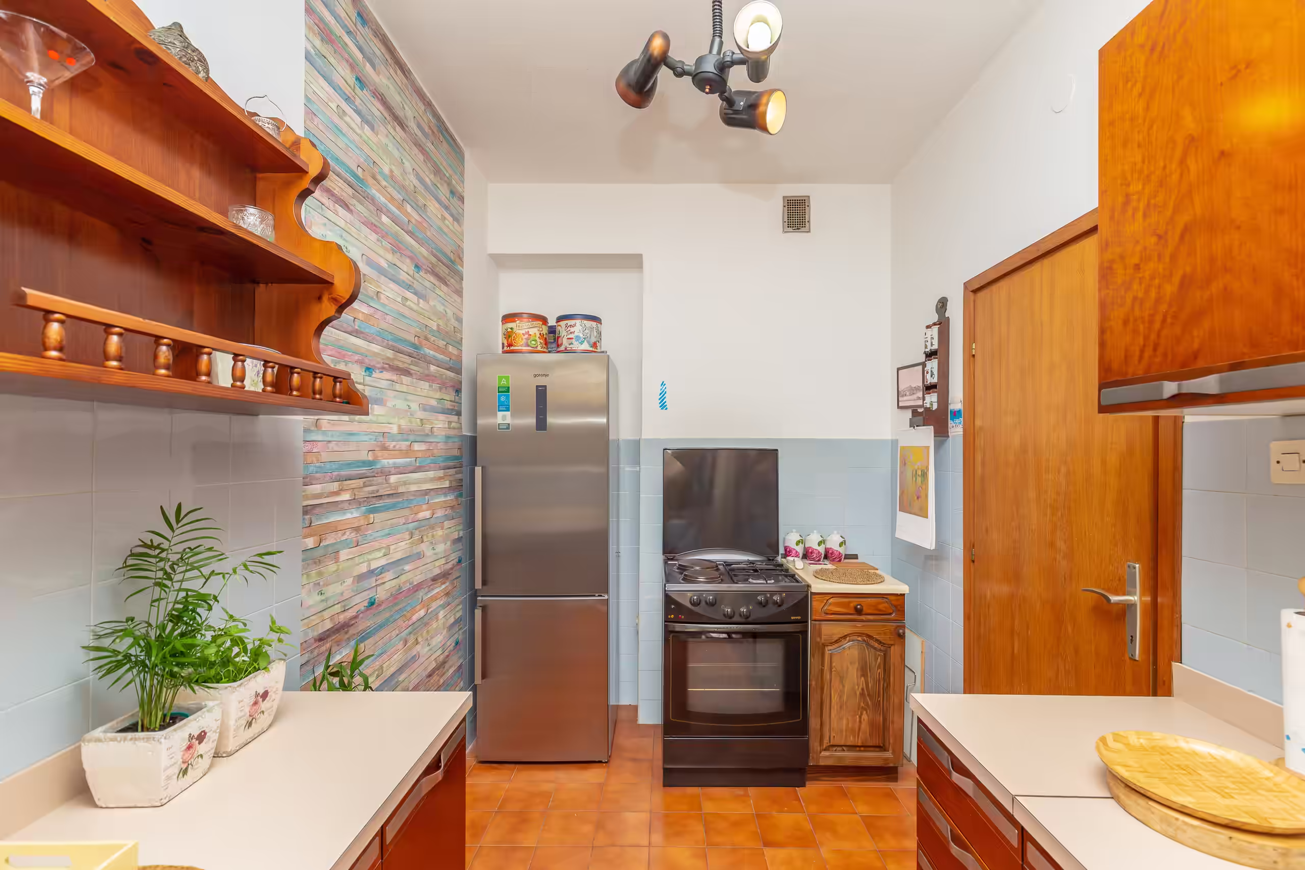 Kitchen workspace and appliances in Apartment Yadre