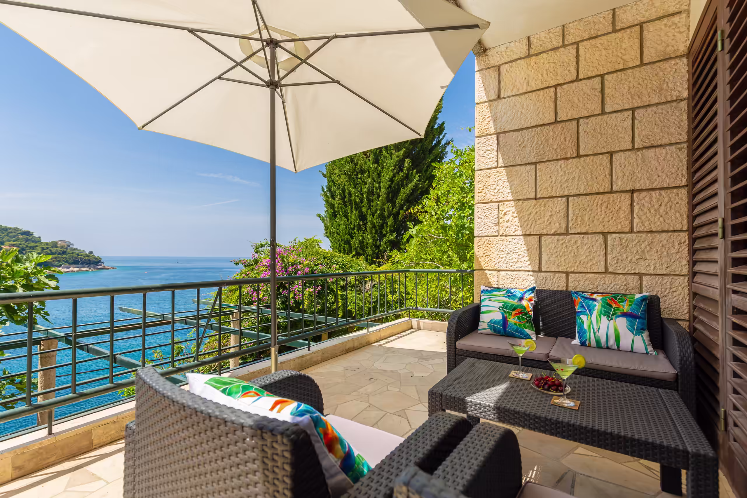 Terrace lounge area beside the sea-view railing